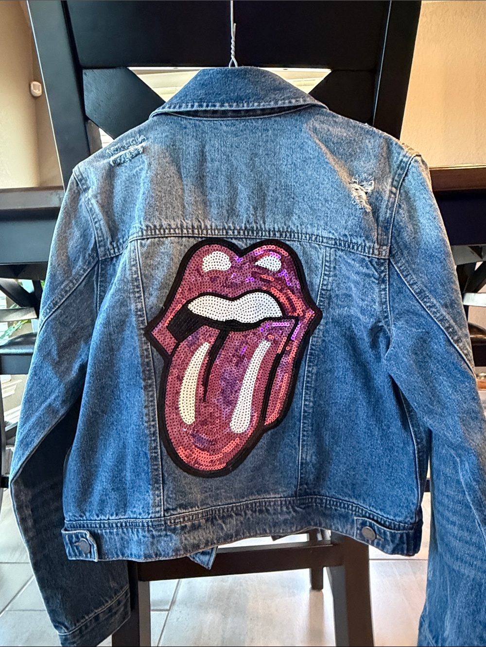 Cropped Light Blue Distressed Denim Jacket with Rolling Stones Logo